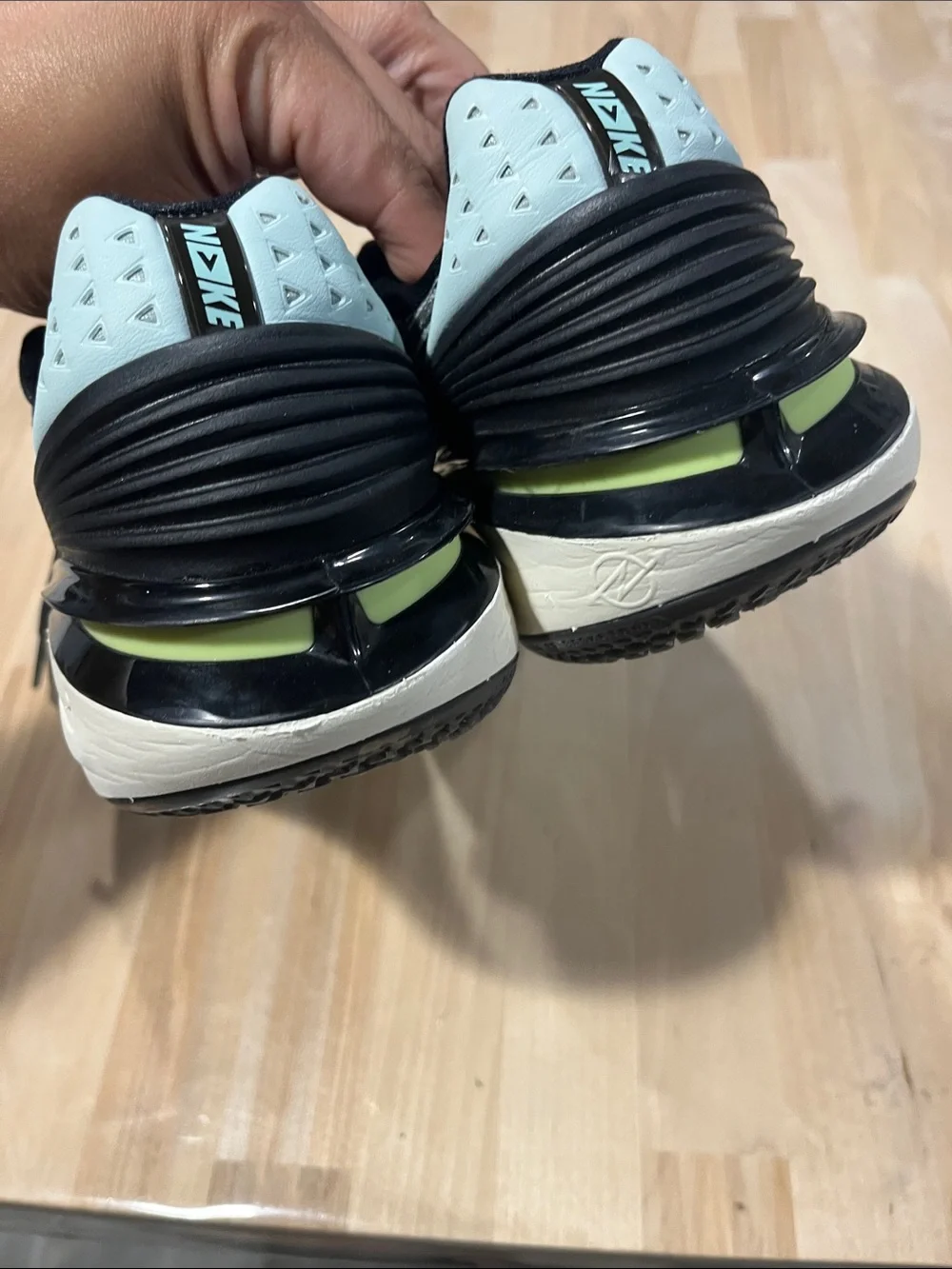 Nike Black and Mint Low-Top Basketball Shoes